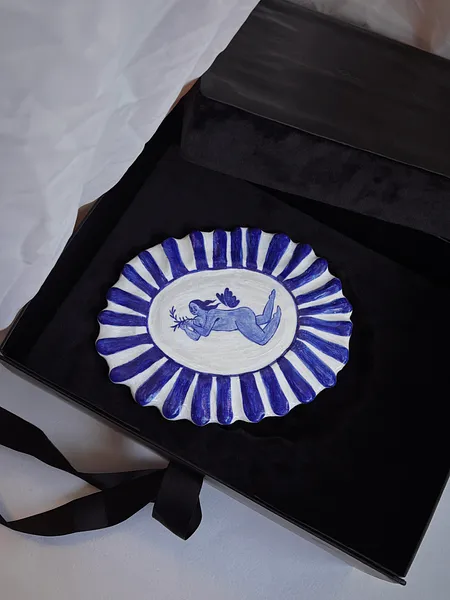 Image of Flying by Diana Ruban , size: 15.2 x 19.5 x 1cm, made of White clay 1200 degrees fired, Sculpture medium, from Georgia , part of the Ceramics and modeling series, priced at $330 Photo 3 of 4.